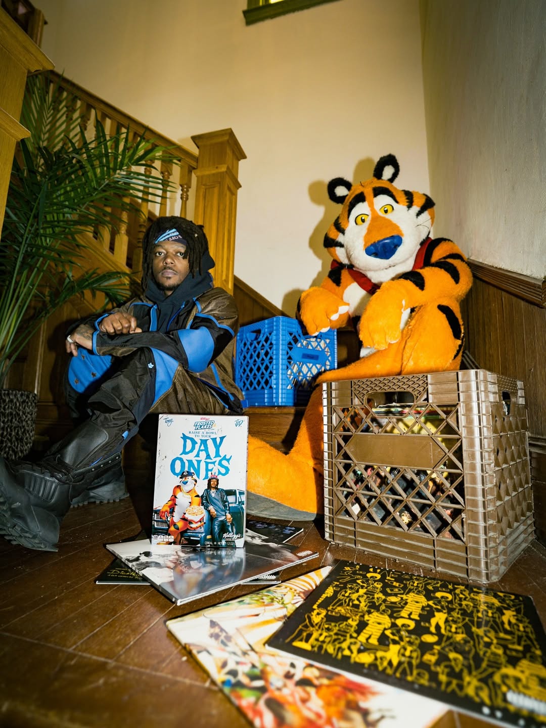 J.I.D appears with Tony the Tiger during the “HEY TONY!” Frosted Flakes campaign launch.